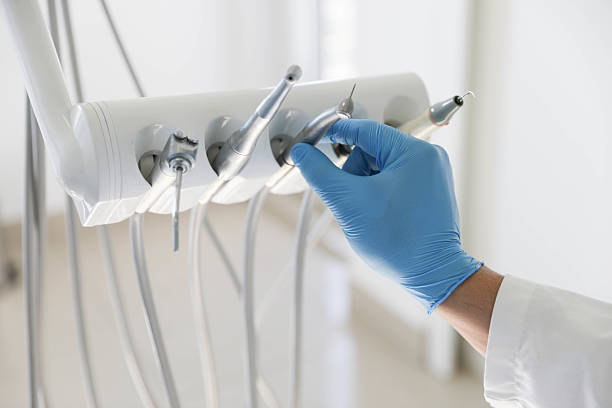 Professional Tooth Extraction technician working in Richmond, VA